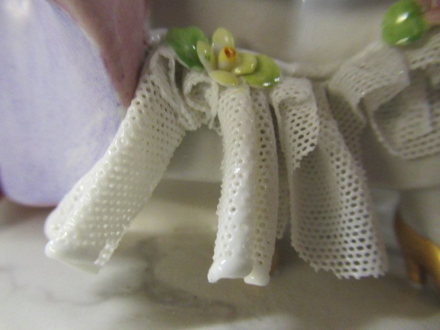 PAIR OF ITALIAN PORCELAIN FIGURES Image