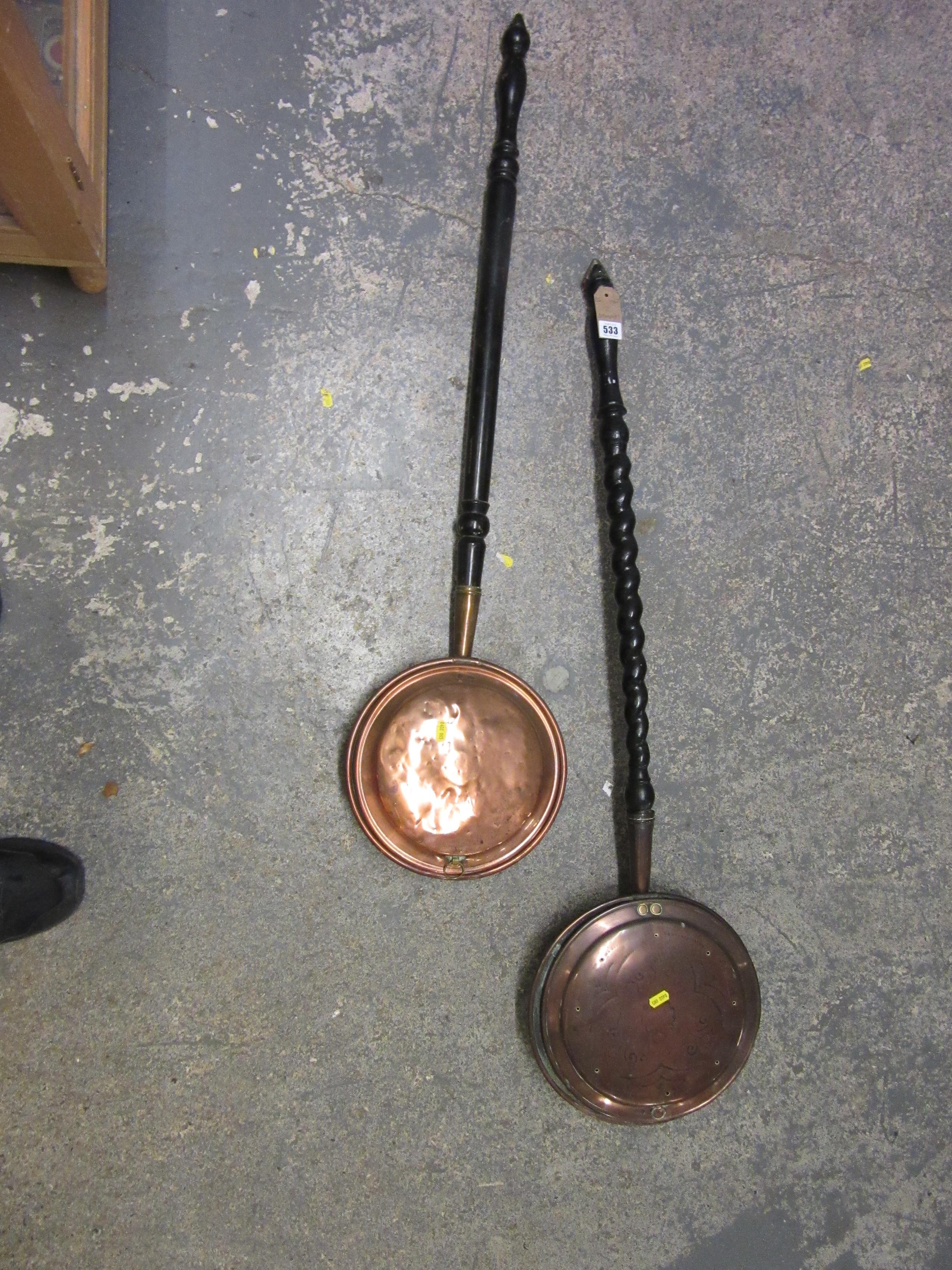 TWO BED WARMERS Image