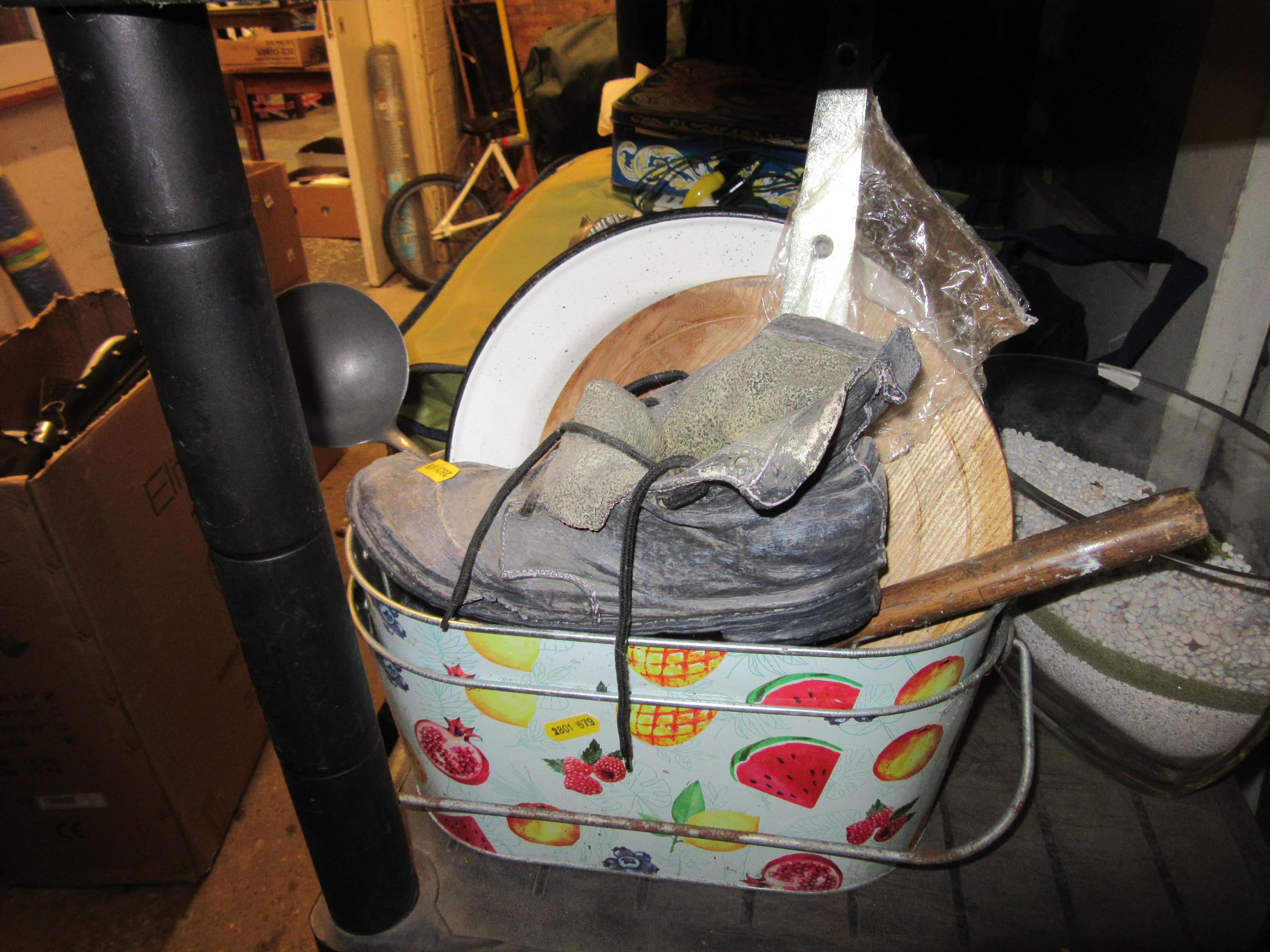 TIN WITH CERAMIC BOOT ETC Image