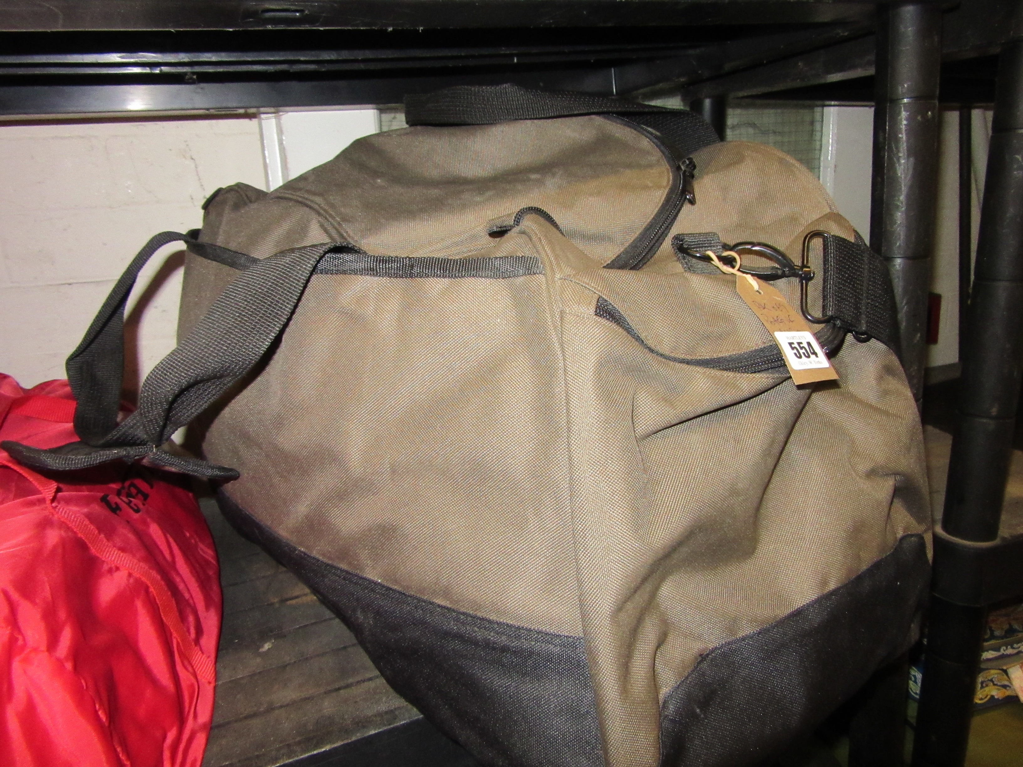 BAG OF WORK AND OUTDOOR CLOTHING Image