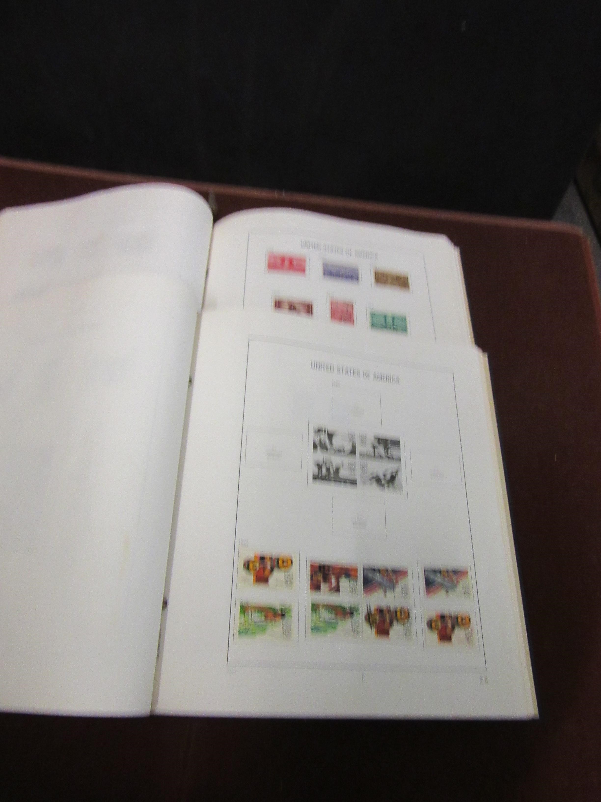 TWO ALBUMS OF US STAMPS Image