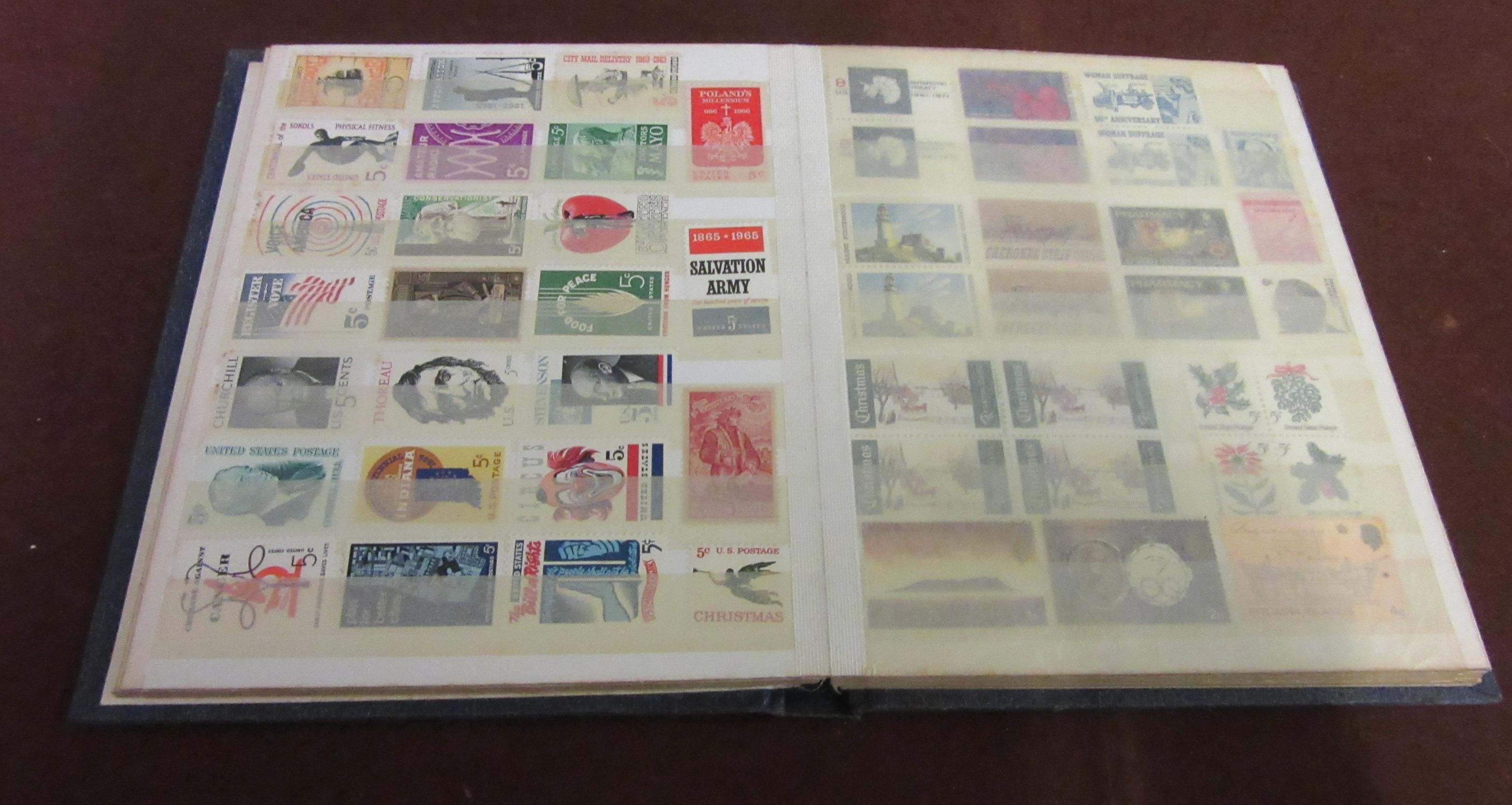 ALBUM OF MINT AND USED UK AND WORLD STAMPS Image