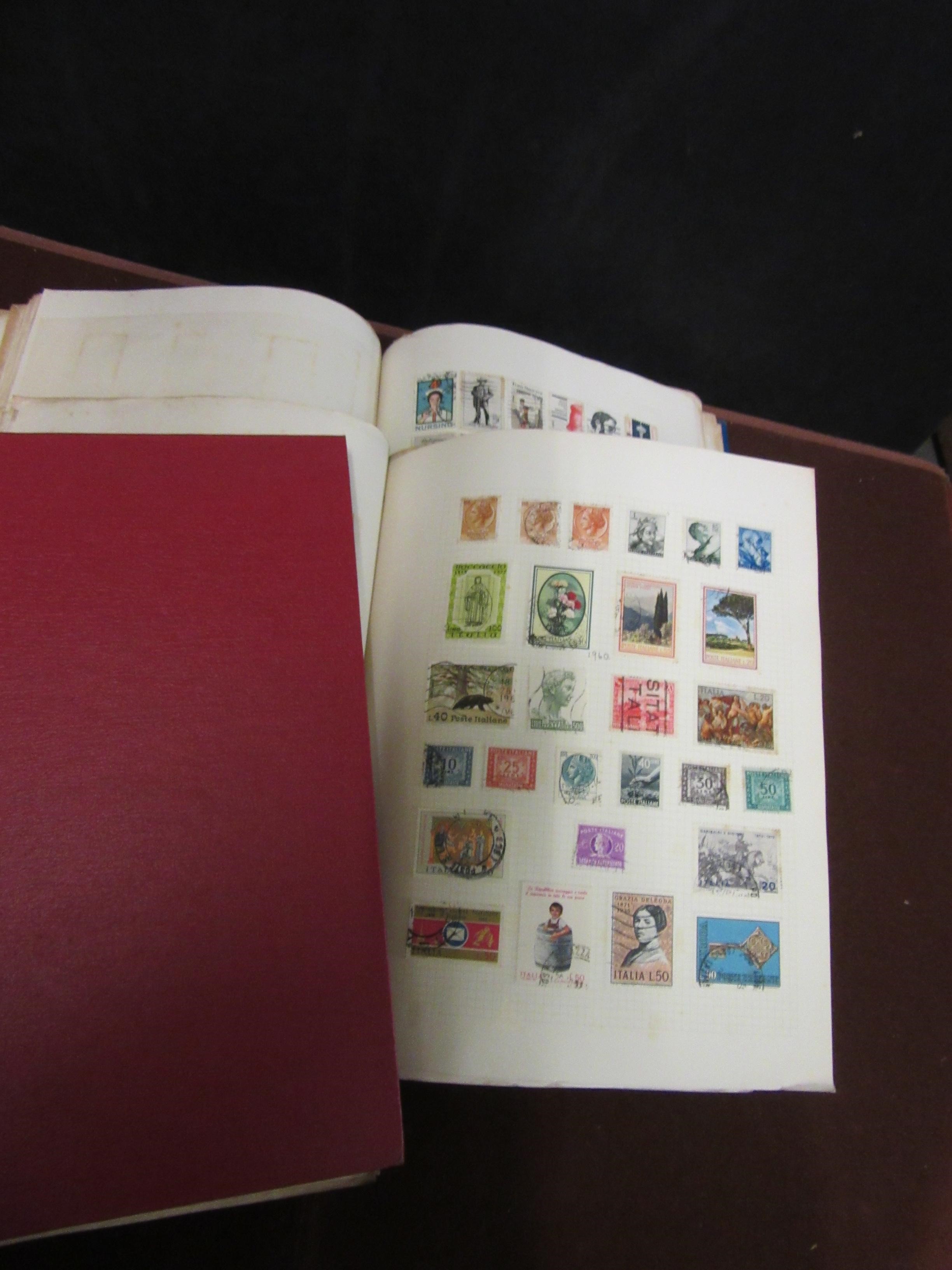 THREE ALBUMS OF WORLD STAMPS Image