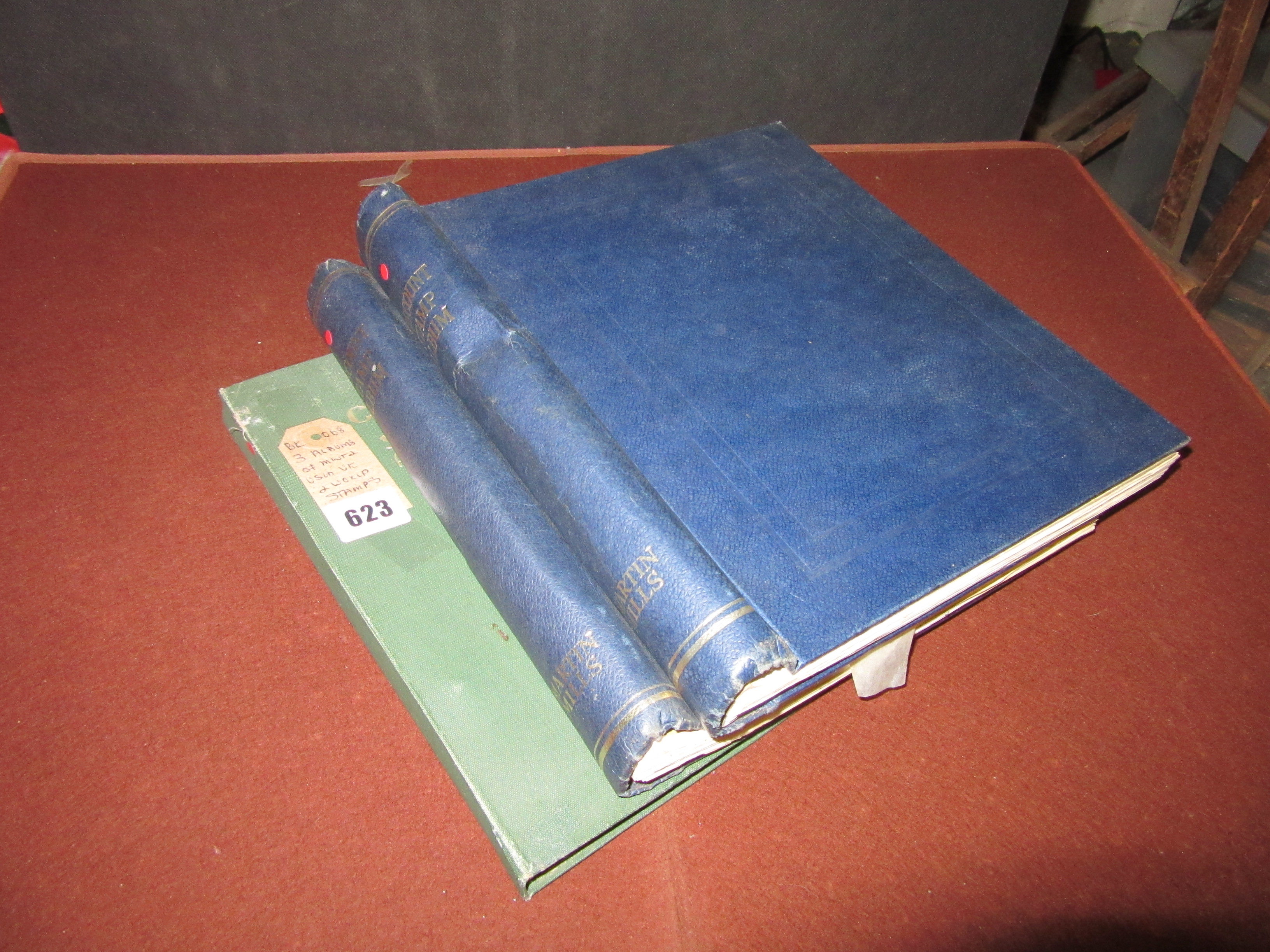 THREE ALBUMS OF MINT AND USED UK AND WORLD STAMPS Image