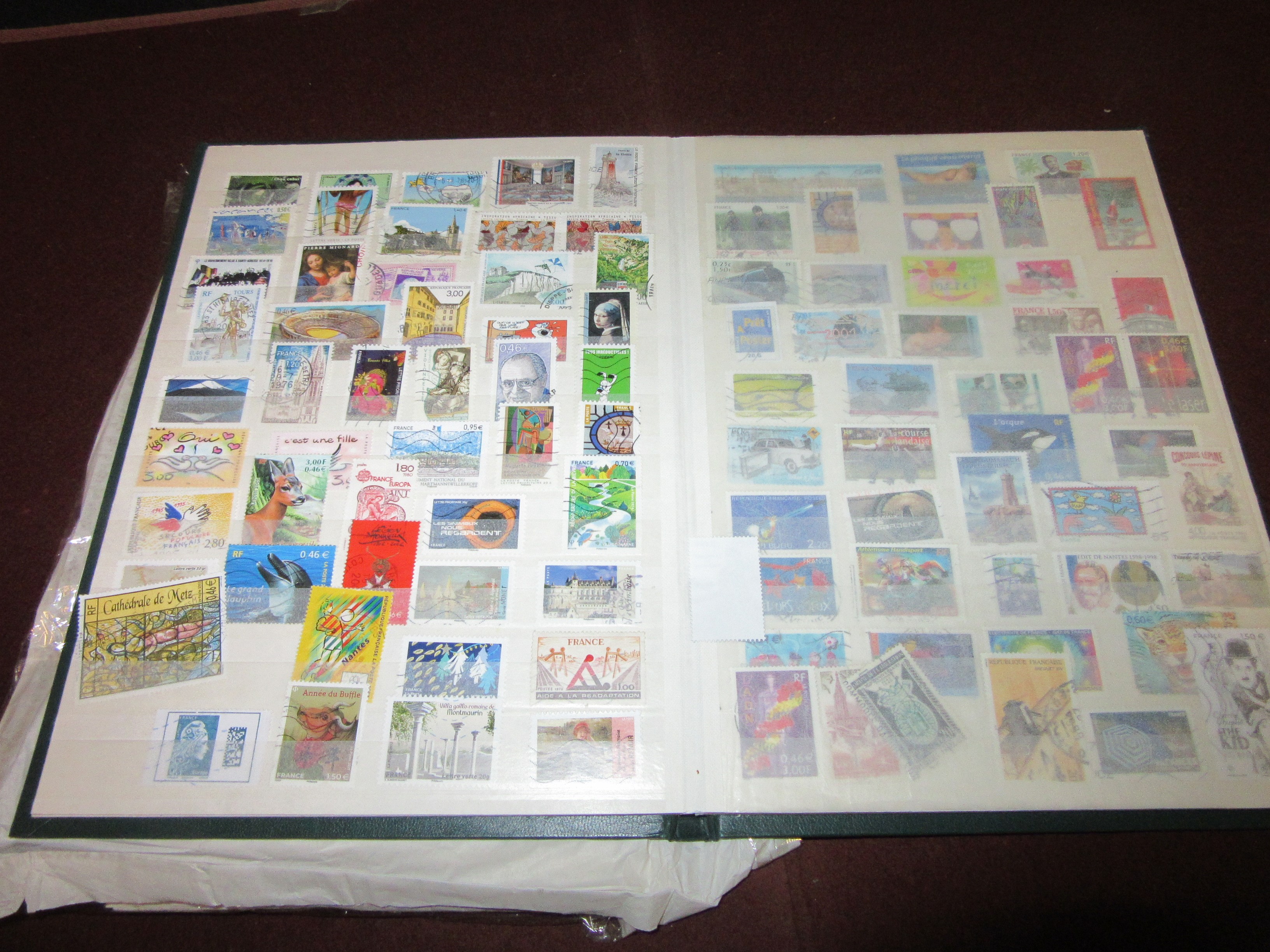 ALBUM AND FOLDER OF FRENCH STAMPS Image