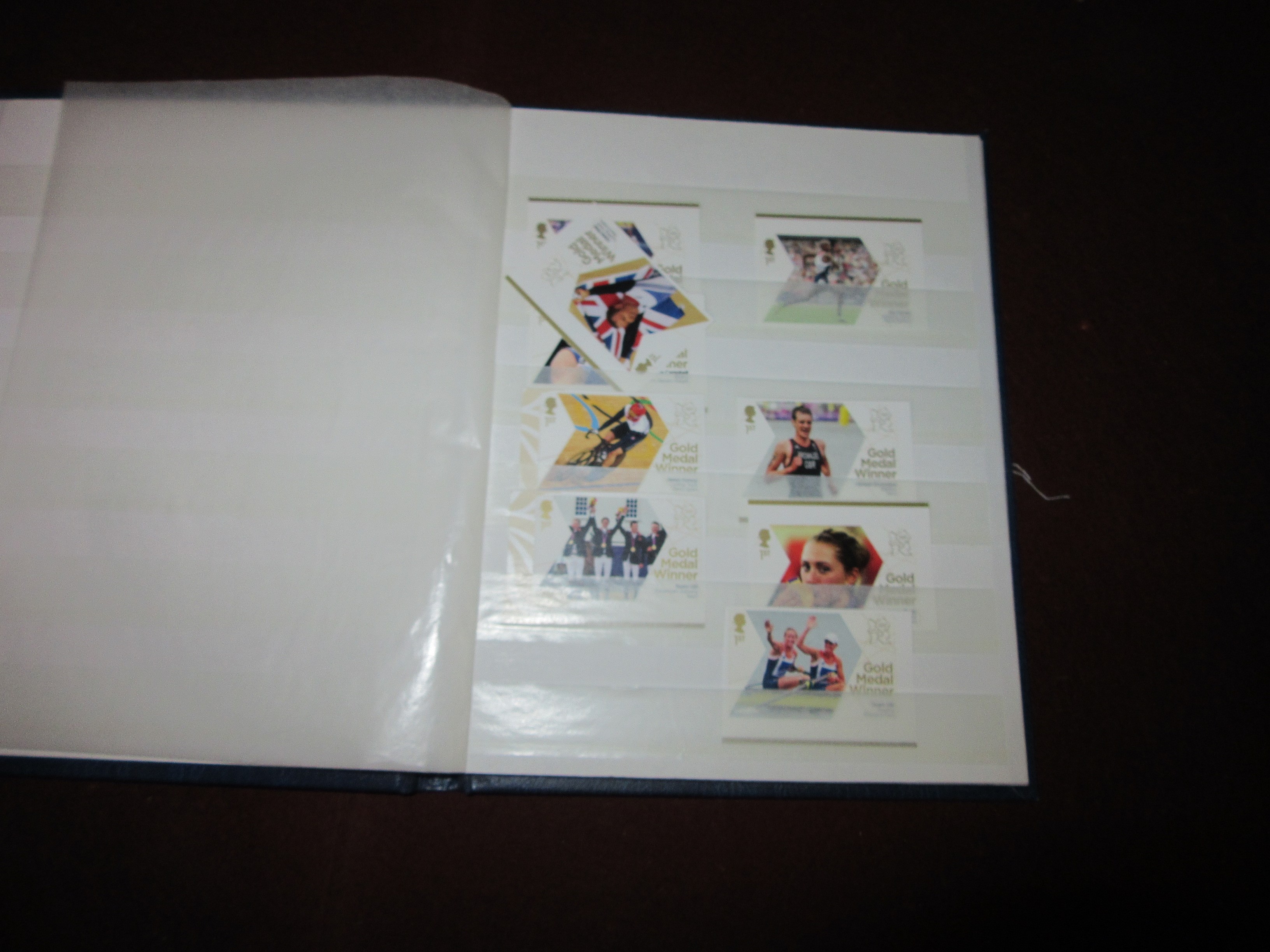 SMALL ALBUM OF TEAM GB 2012 OLYMPIC STAMPS Image