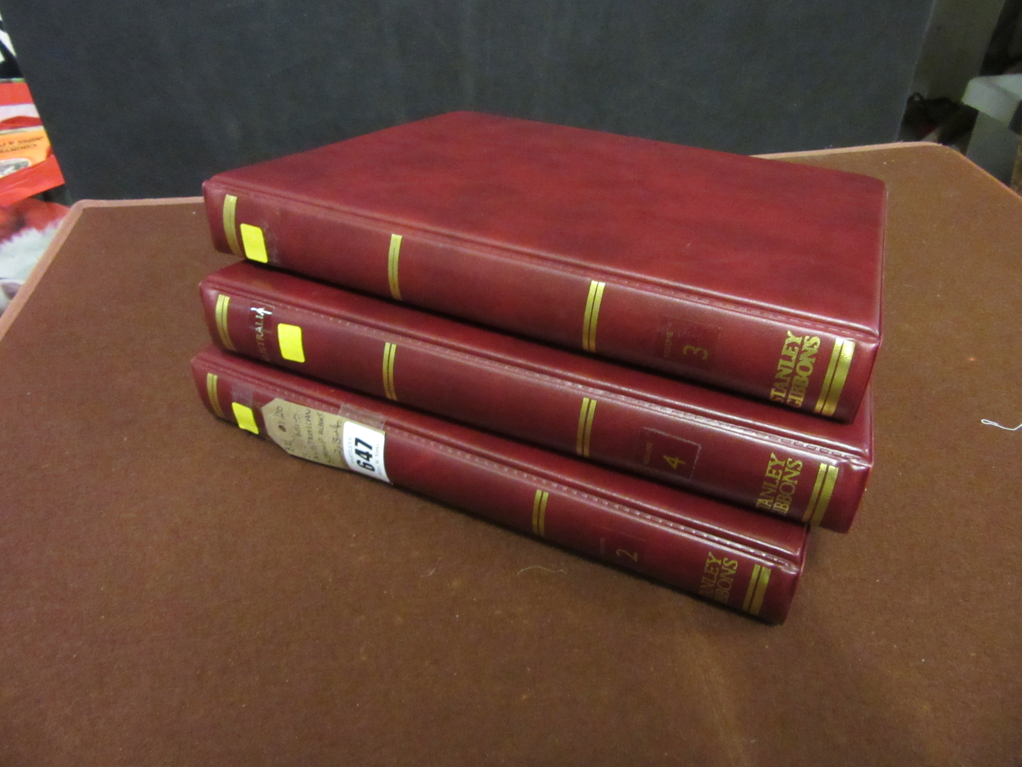 THREE STANLEY GIBBONS AUSTRALIAN STAMP ALBUMS Image
