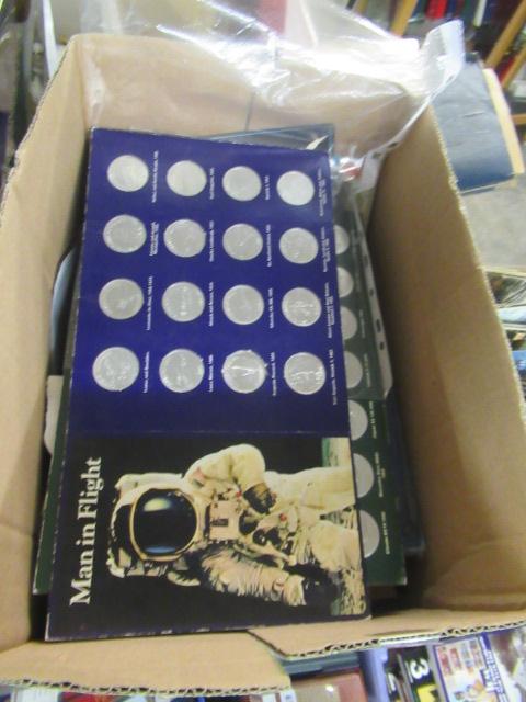 BOX OF STAMPS WITH MAN IN FLIGHT AND HISTORICAL MEDALLION SETS Image