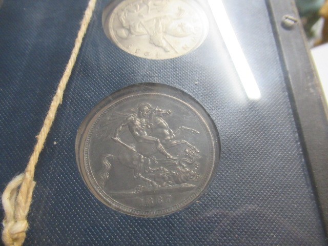 NINE FRAMED GB CROWNS INCLUDING HIGH GRADE 1887,1935 AND 1951 EXAMPLES Image