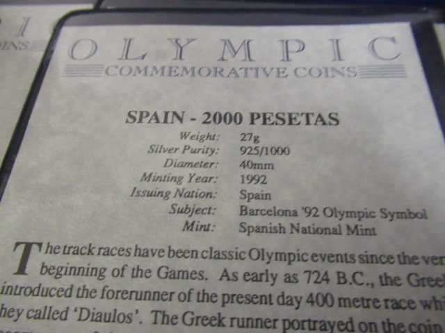 CASED OLYMPIC GAMES COIN COLLECTION - TWNETY THREE SILVER AND ONE BRONZE COIN Image