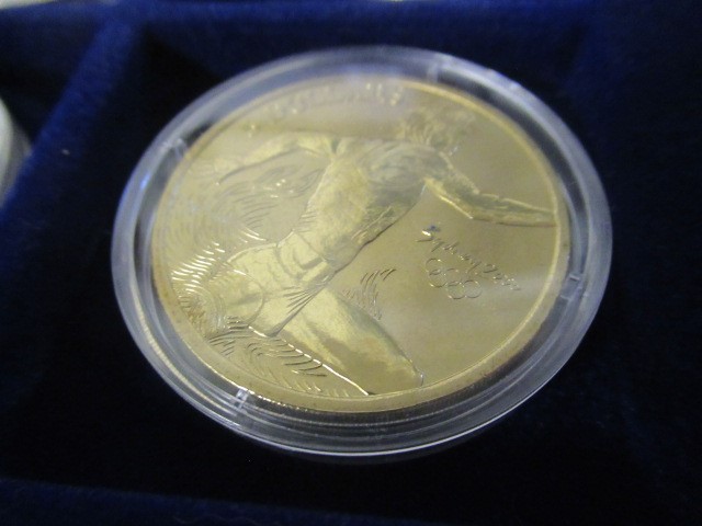 CASED OLYMPIC GAMES COIN COLLECTION - TWNETY THREE SILVER AND ONE BRONZE COIN Image