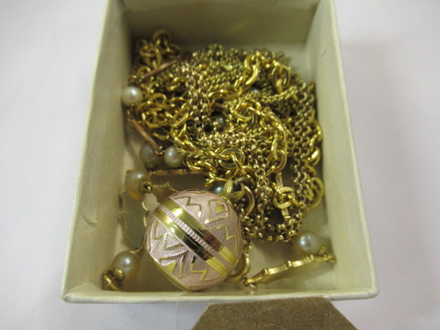 NECKLACES, BRACELETS AND A SPHERICAL WATCH Image