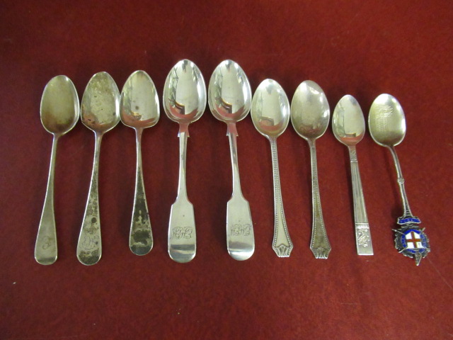 EIGHT SILVER TEASPOONS AND ONE EPNS SPOON Image