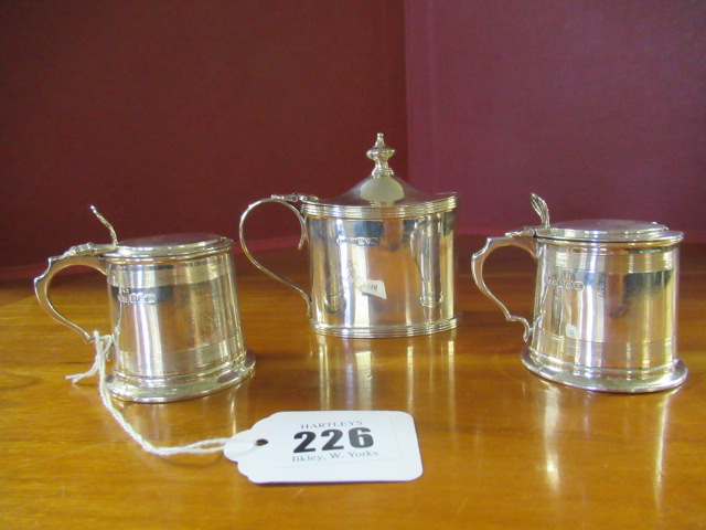 THREE SILVER MUSTARD POTS WITH LINERS Image