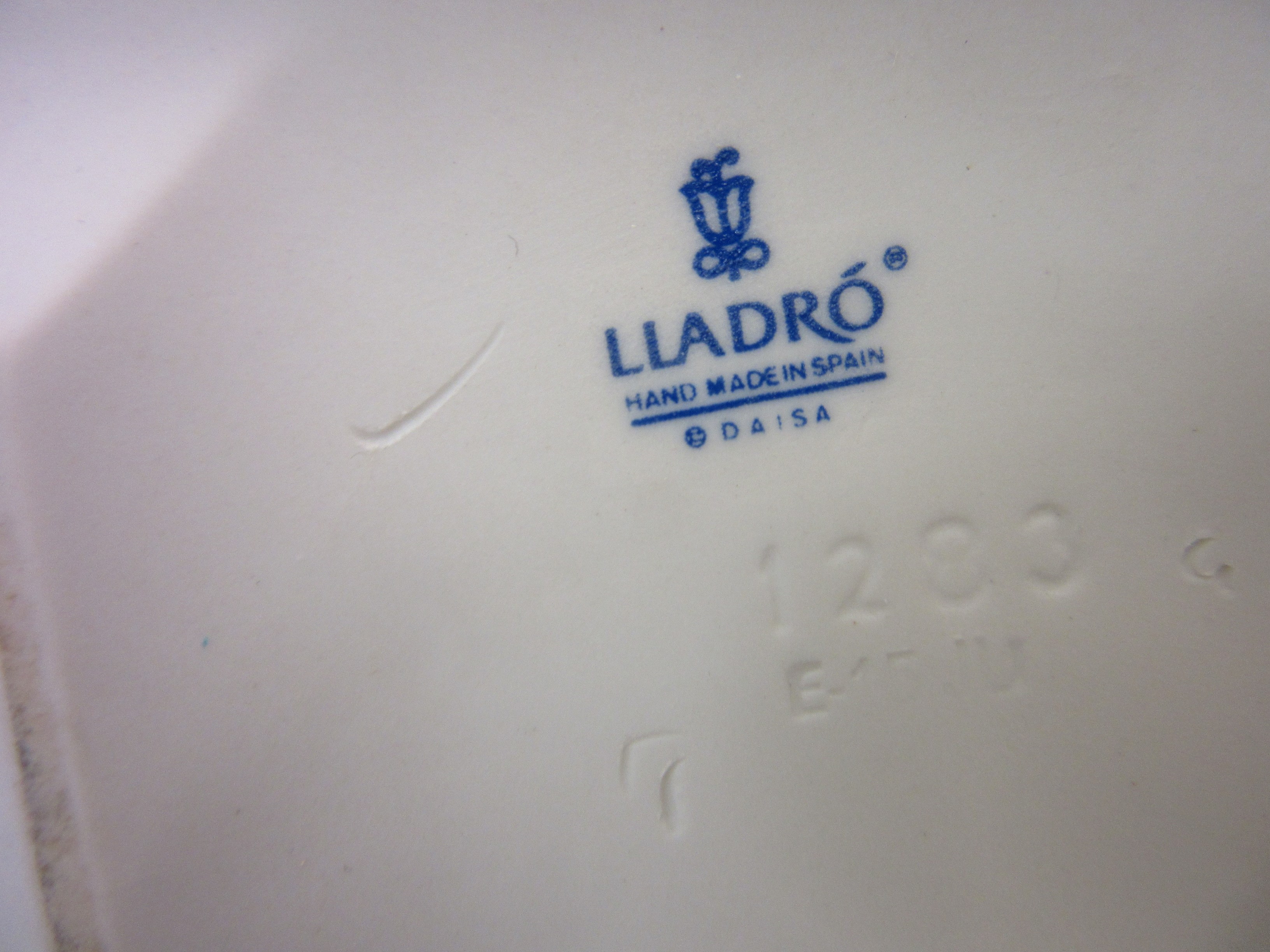 LLADRO CHILD WITH BARROW Image