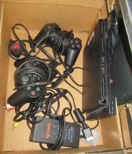 PLAYSTATION AND TWO CONTROLLERS Image