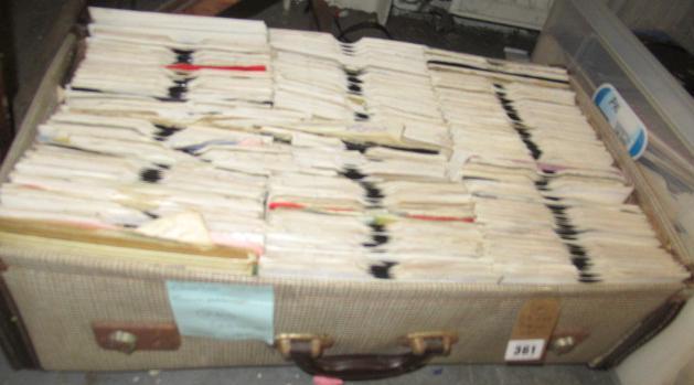 CASE OF 45 RPM RECORDS Image