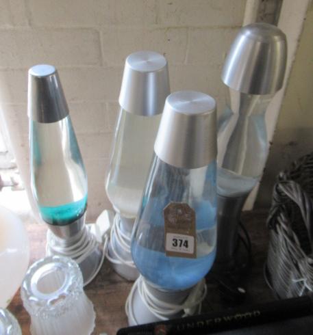 FOUR UNBOXED LAVA LAMPS Image