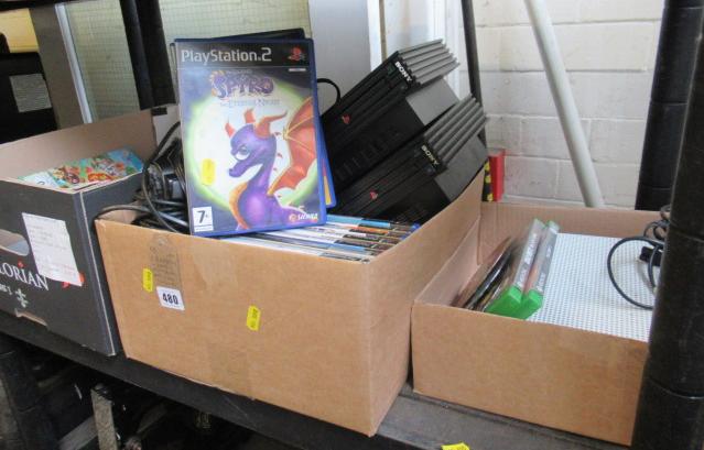 TWO PLAYSTATION 2 CONSOLES WITH GAMES Image