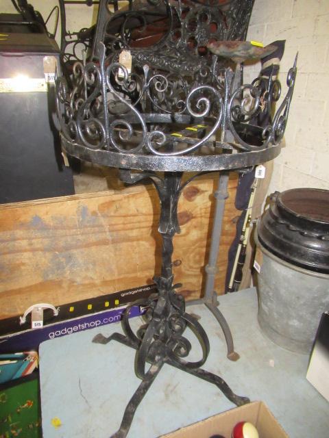 CAST IRON CANDLE HOLDER WITH A CAST IRON STAND Image