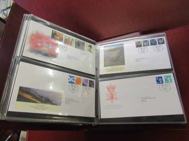 TWO ALBUMS OF MODERN UK FIRST DAY COVERS 1998-2000 WITH A RED WINDSOR ALBUM Image