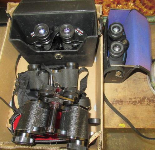 FOUR BINOCULARS Image