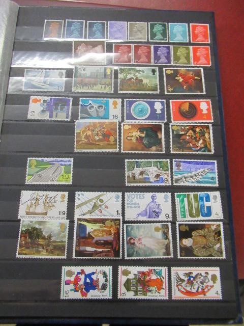 RED FOLDER AND BLUE STOCK BOOK OF GB PRE-DECIMAL MINT STAMPS IN BLOCKS, SOME FULL SHEETS Image