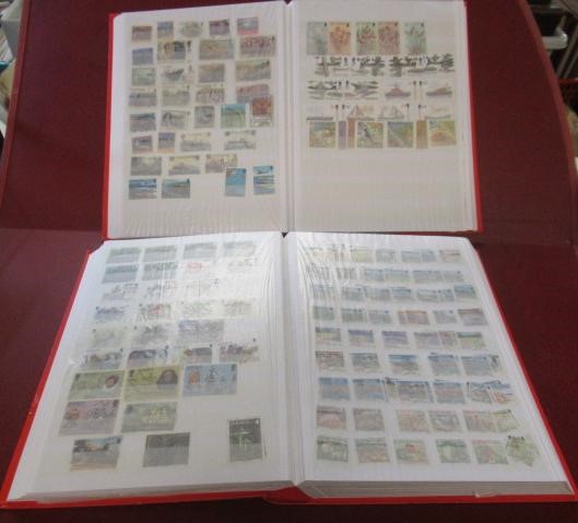 TWO ALBUMS OF MINT AND USED GUERNSEY AND JERSEY STAMPS Image
