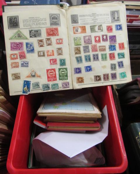 RED BOX OF STAMP ALBUMS AND PACKETS OF STAMPS Image