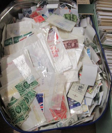 TIN OF WORLD STAMPS Image