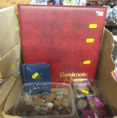 TWO TUBS OF MAINLY BRITISH COINS WITH AN EMPTY BANKNOTE ALBUM Image