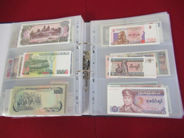 LARGE QUANTITY OF MINT AND USED WORLD BANK NOTES Image