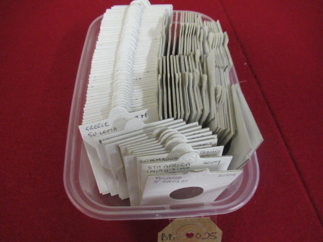 BOX OF WORLD COINS IN PACKETS Image