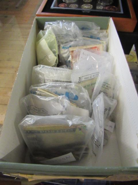 HEAVY BOX OF WORLD COINS AND BANK NOTES IN BAGS Image