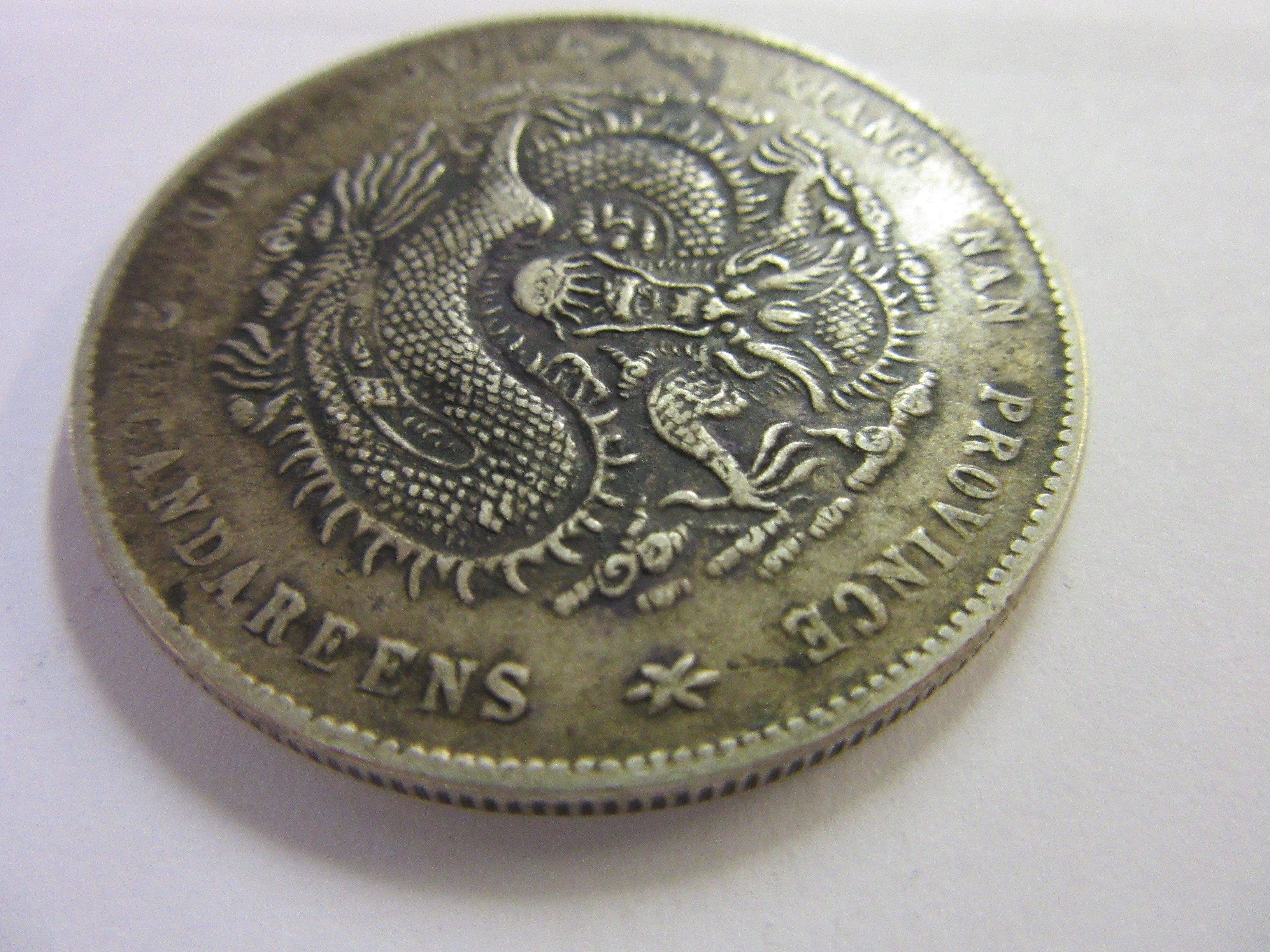 FOUR SILVER CHINESE COINS Image