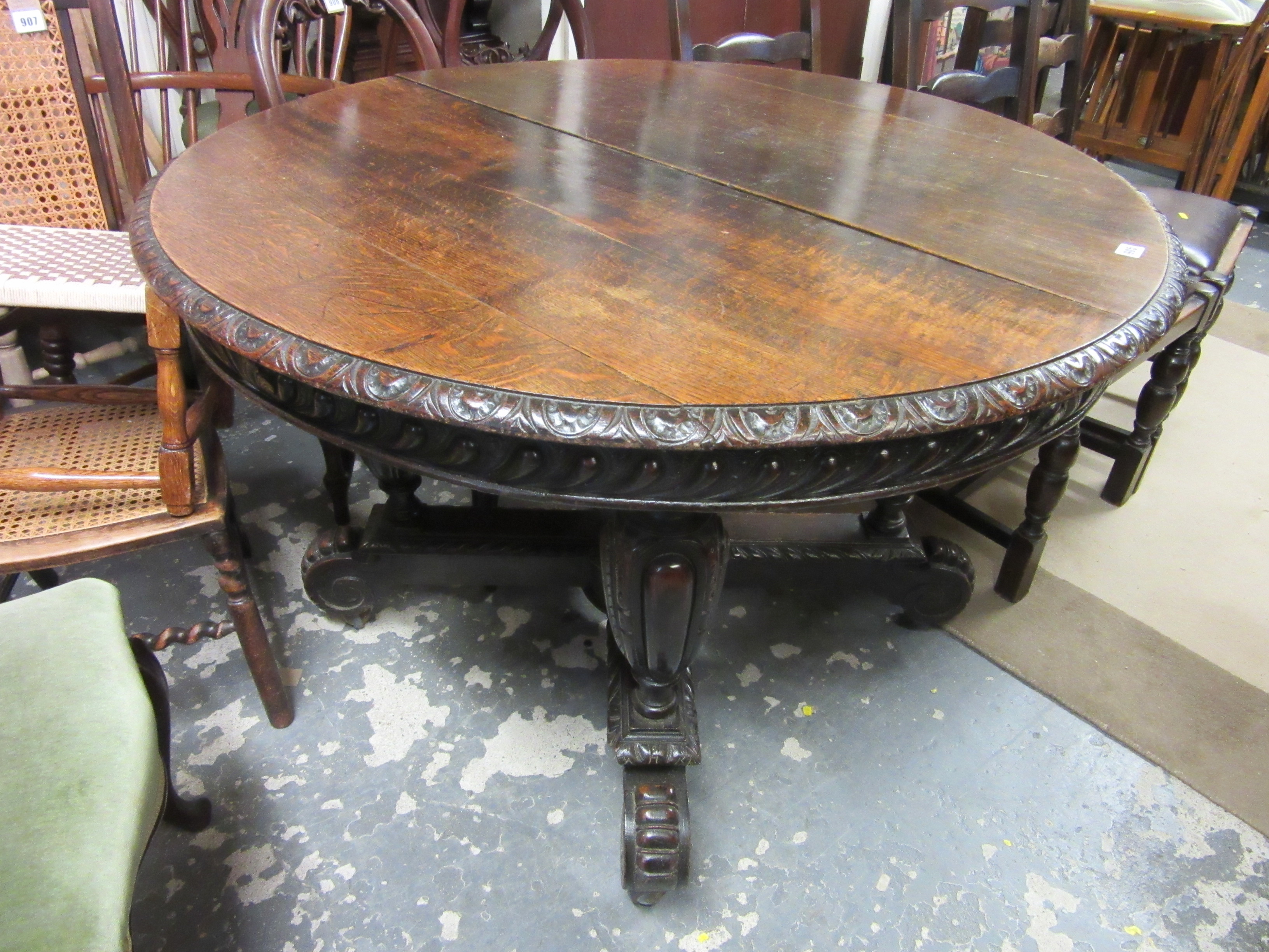 CIRCULAR CARVED OAK TABLE Image