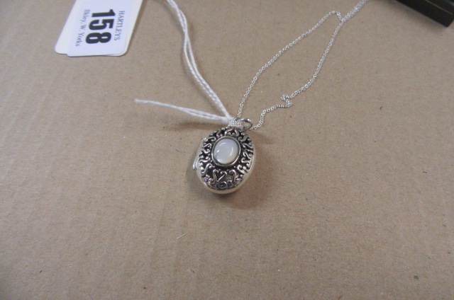 SILVER LOCKET ON SILVER CHAIN Image