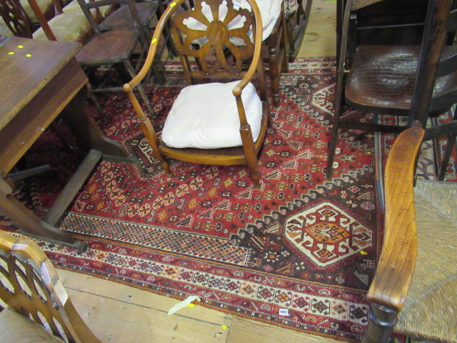 RED AND CREAM PATTERNED CARPET Image