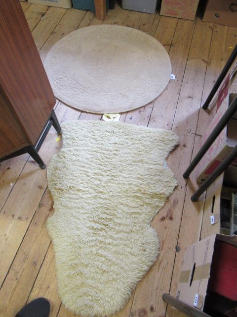 CIRCULAR RUG AND ANOTHER Image