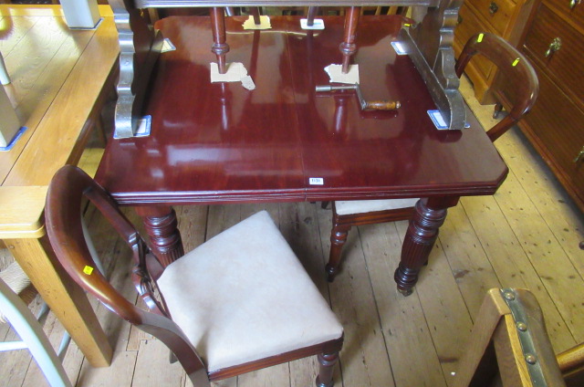 MAHOGANY WIND OUT DINING TABLE AND FOUR CHAIRS Image