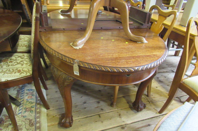 OAK EXTENDING  TABLE WITH CLAW AND BALL FEET Image