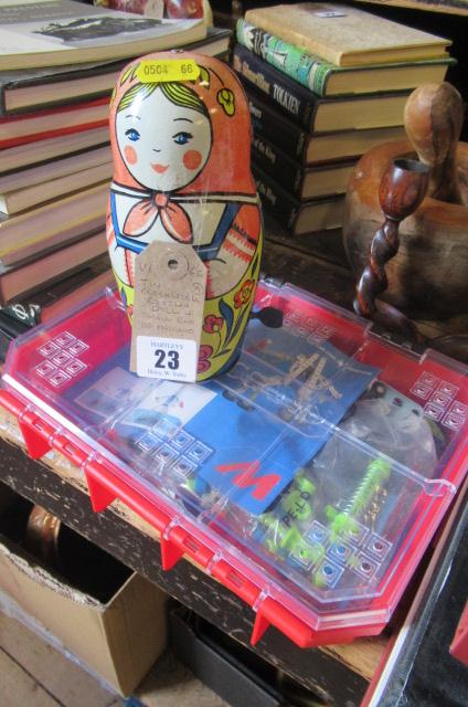 TIN CLOCKWORK RUSSIAN DOLL AND SMALL BOX OF MECCANO Image
