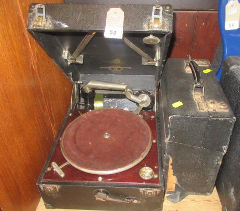WIND UP RECORD PLAYER AND A CASE OF 78 RPM RECORDS Image