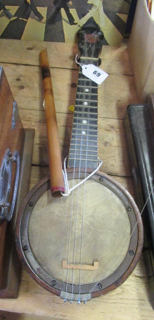 VINTAGE UKELELE AND BAMBOO FLUTE Image