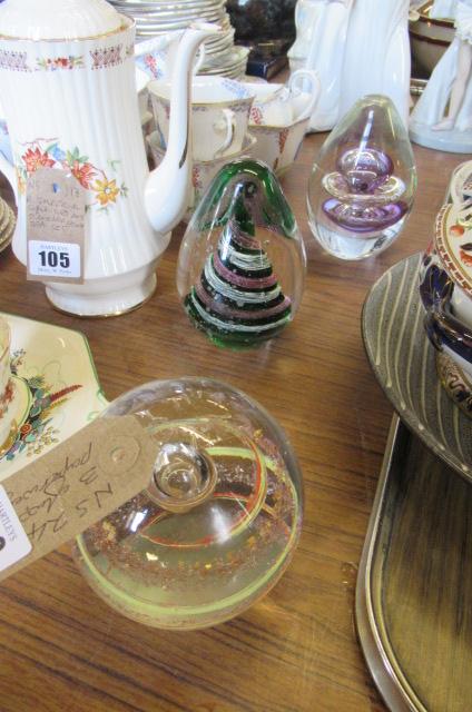 THREE GLASS PAPERWEIGHTS Image