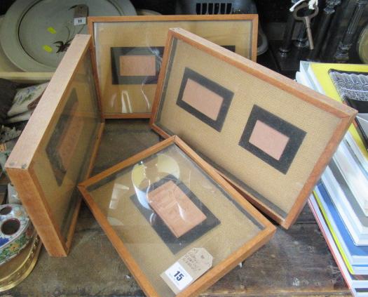 FOUR FRAMED TERRACOTTA PLAQUES Image