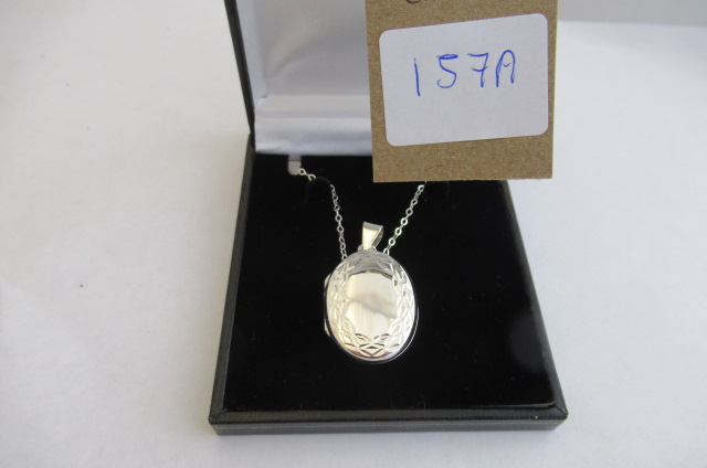 SILVER LOCKET ON SILVER CHAIN Image
