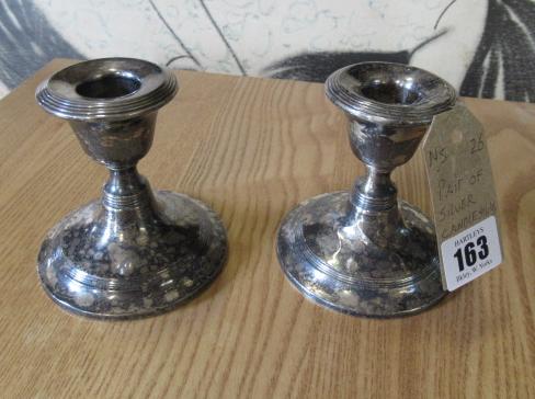PAIR OF SILVER CANDLESTICKS Image