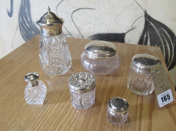 SIX SILVER TOPPED BOTTLES Image