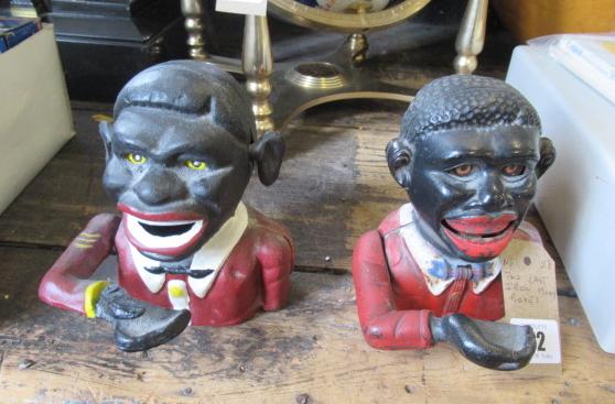 TWO CAST IRON MONEY BOXES Image